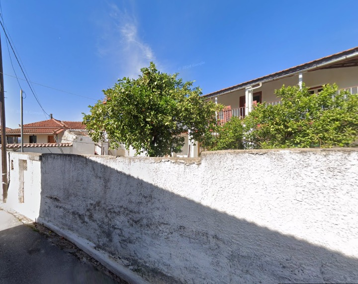 Front exterior view of stone house in Ammos, Messinia